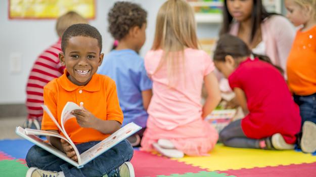 Happy Child Reading Image